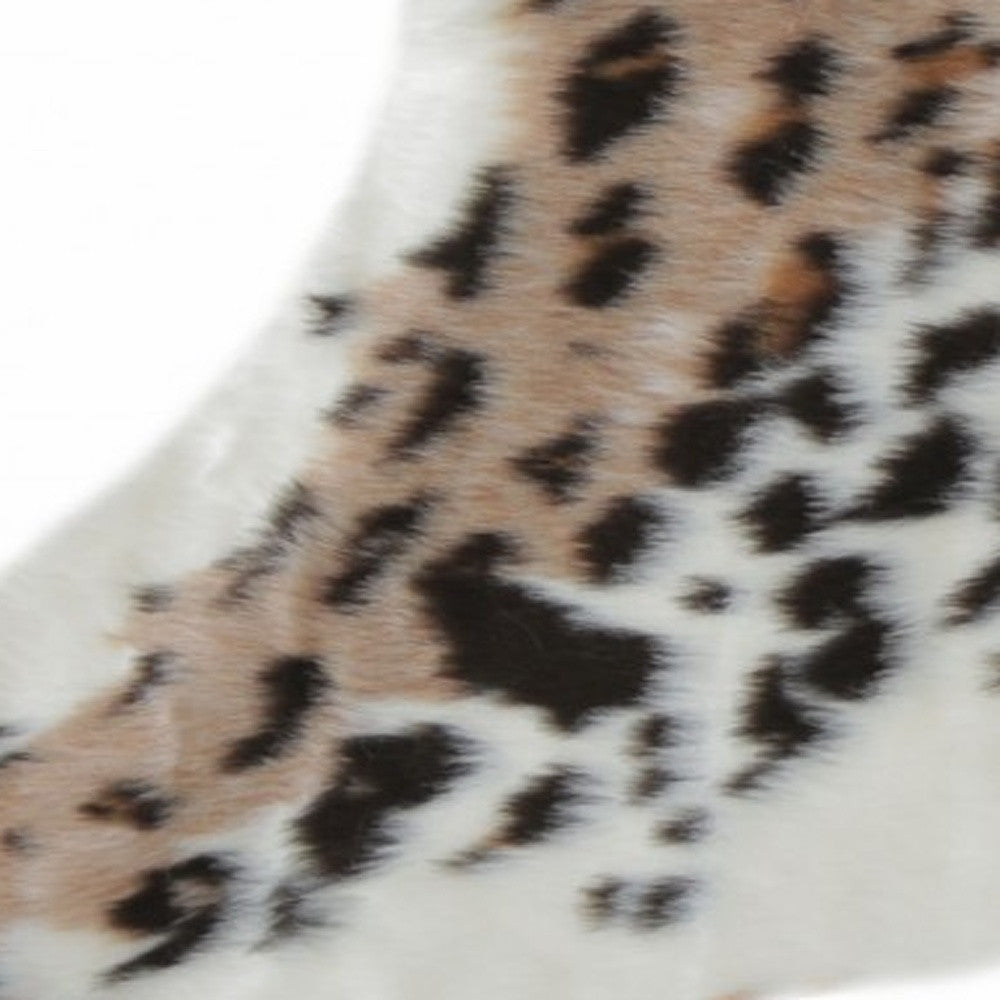 4' X 5' Ivory Black and Brown Faux Fur Leopard Print Area Rug