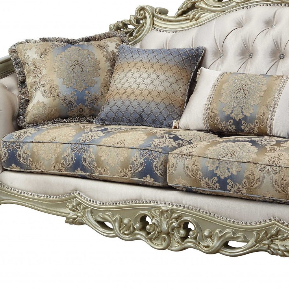 40" Antiqued White Velvet Curved Floral Sofa And Toss Pillows With Champagne Legs