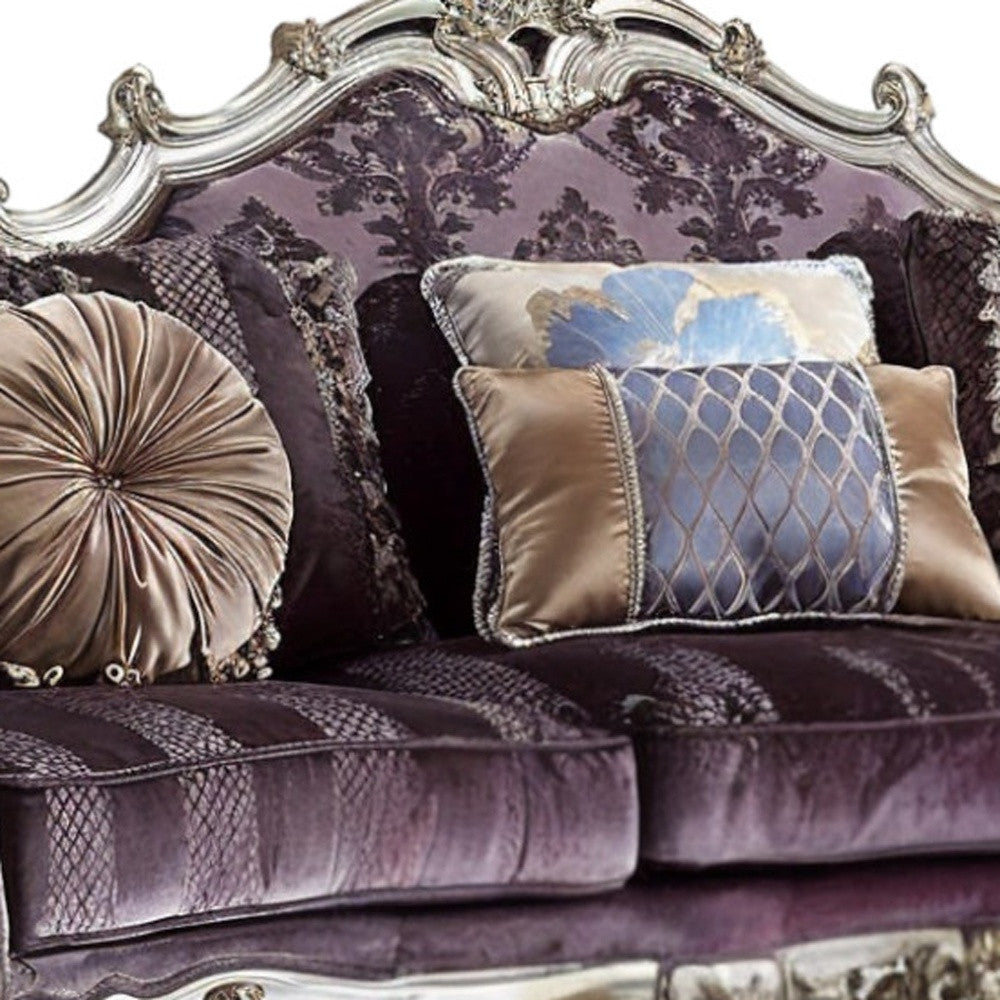 52" Curved Dark Purple Velvet Sofa with Toss Pillows and Platinum Legs