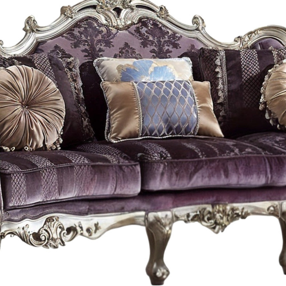 52" Curved Dark Purple Velvet Sofa with Toss Pillows and Platinum Legs