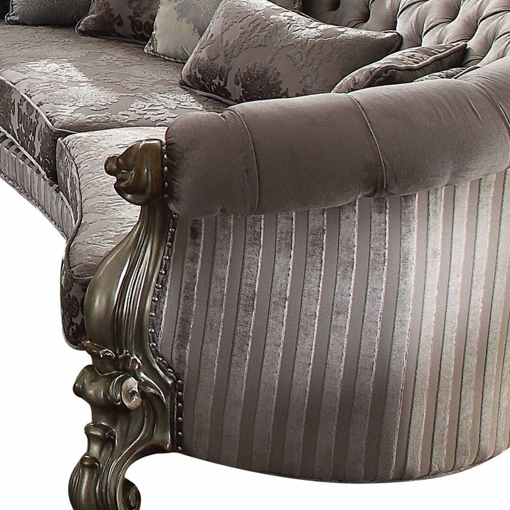 55" Gray Velvet Curved Floral Sofa with Toss Pillows and Champagne Legs