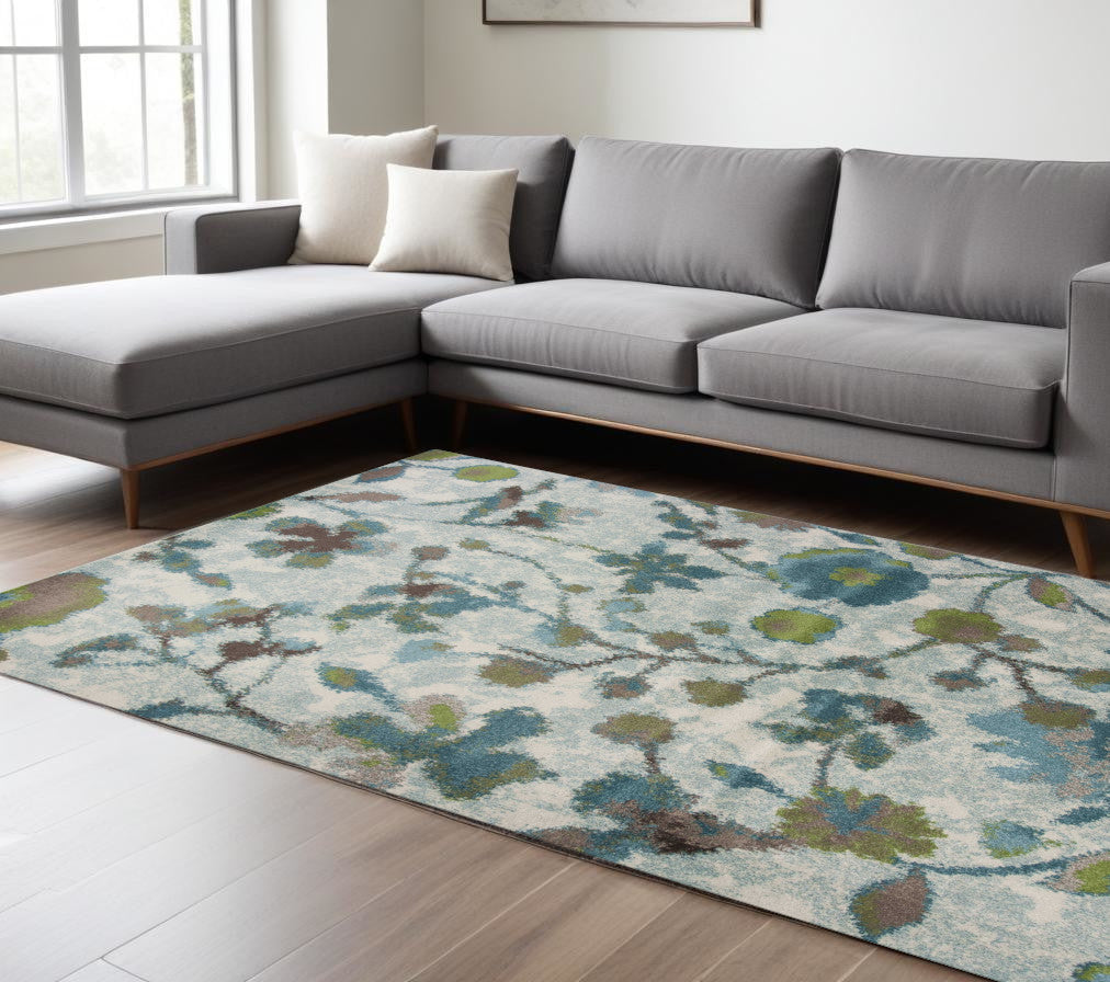 8' X 11' Teal Blue Machine Woven Floral Indoor Area Rug