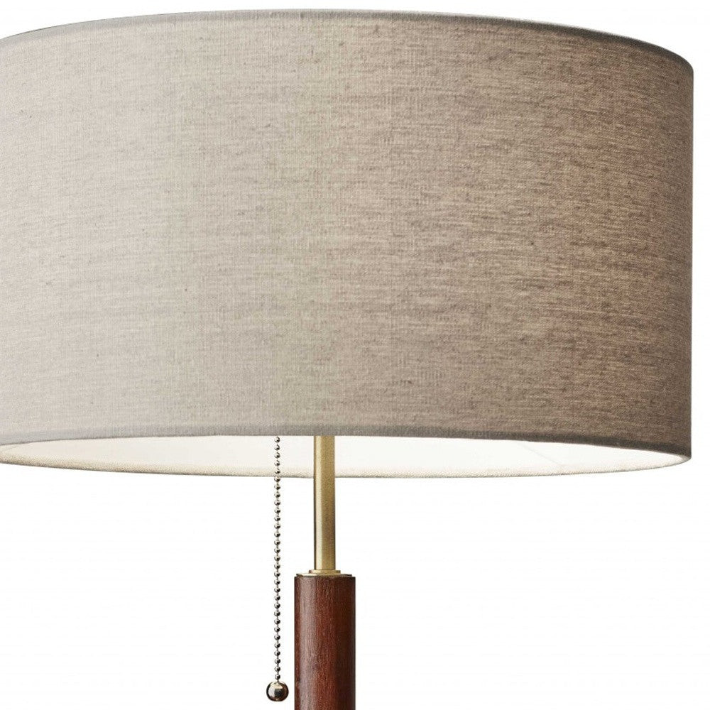 26" Antiqued Brass Solid Wood Table Lamp With Beige Drum Shade