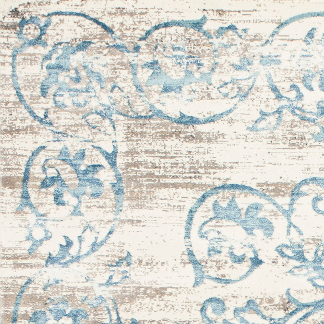 10' X 13' Ivory and Blue Floral Area Rug