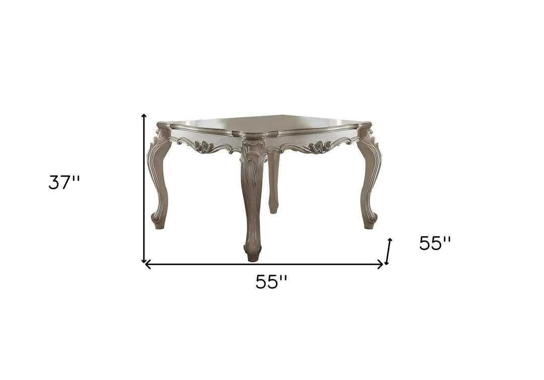 55-Inch Antiqued White Solid and Manufactured Wood Dining Table