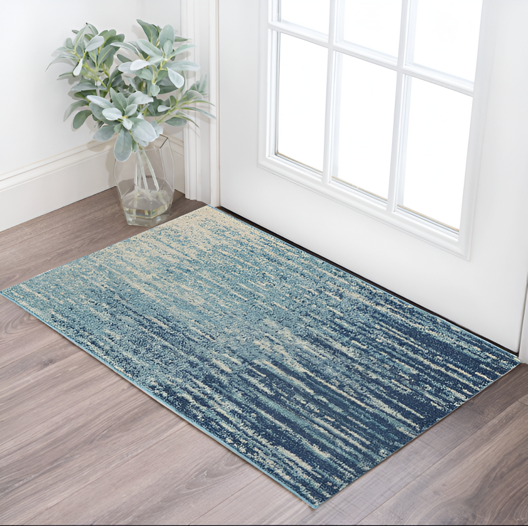 2' X 3' Blue and Ivory Abstract Power Loom Area Rug