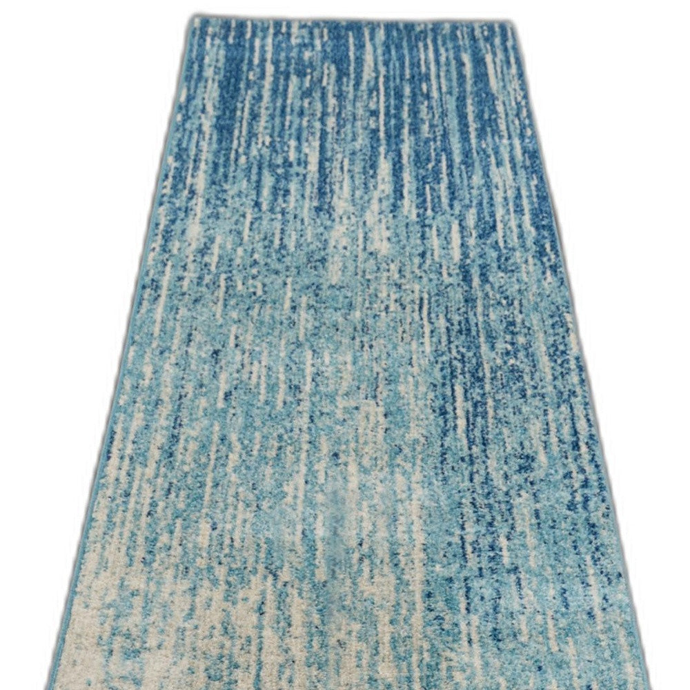 2' X 3' Blue and Ivory Abstract Power Loom Area Rug