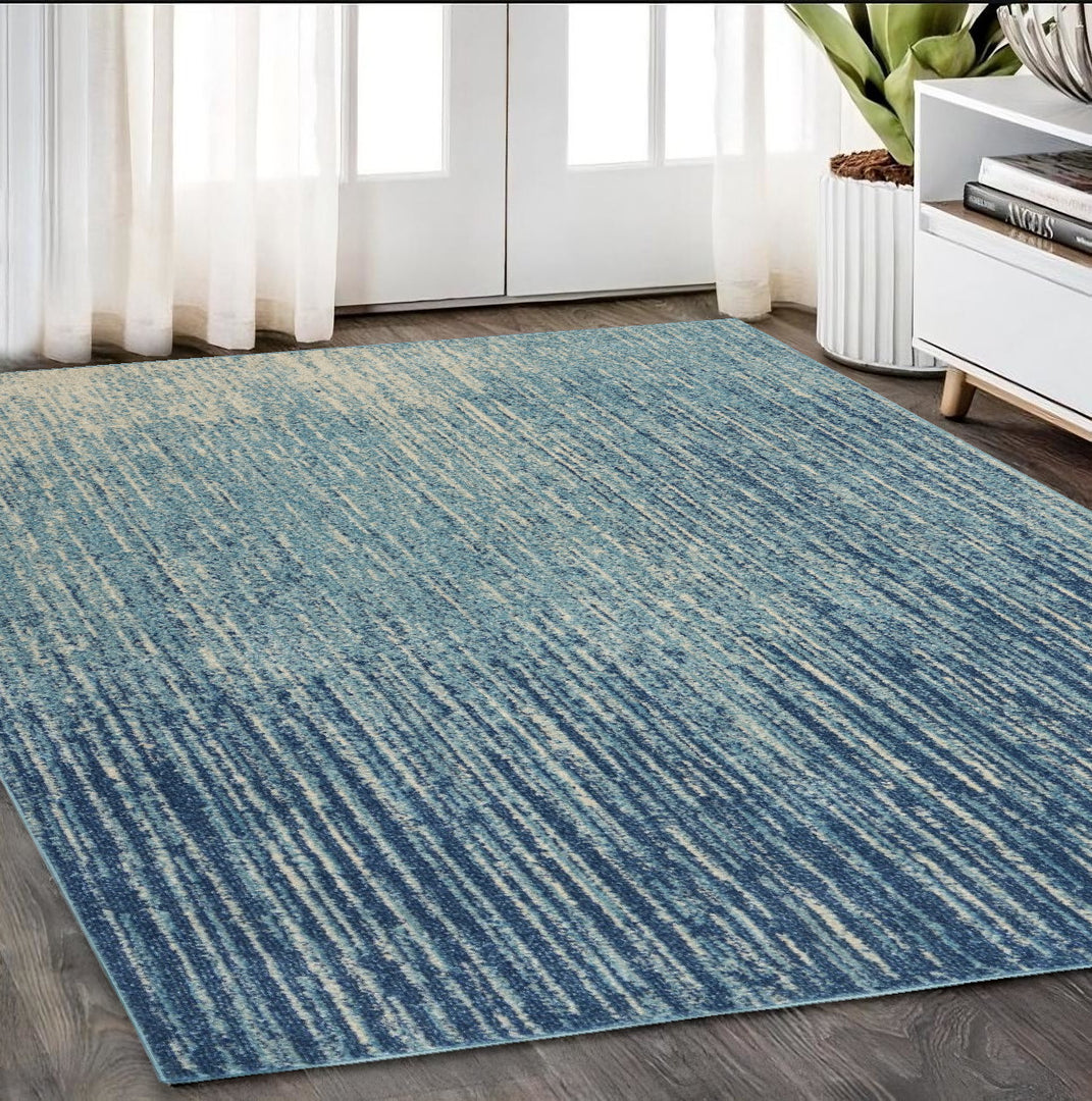 2' X 3' Blue and Ivory Abstract Power Loom Area Rug