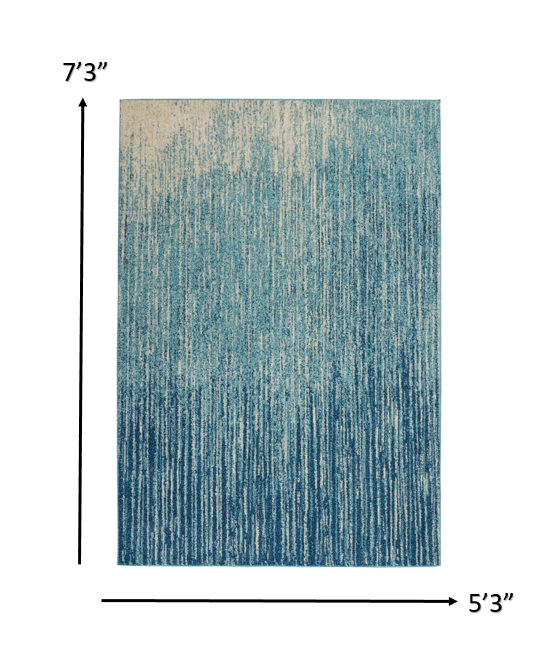 2' X 3' Blue and Ivory Abstract Power Loom Area Rug