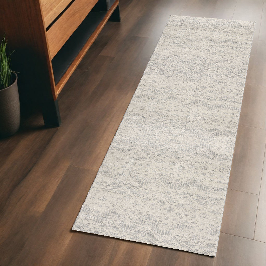 2' X 3' Ivory Distressed Ikat Pattern Scatter Rug