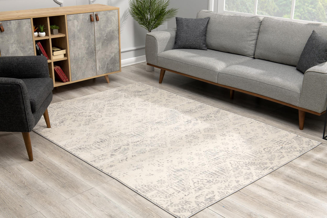 2' X 3' Ivory Distressed Ikat Pattern Scatter Rug