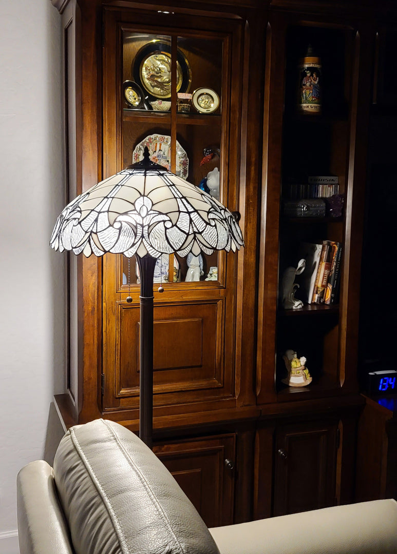 62" Brown Two Light Torchiere Floor Lamp With White Fleur De Lis Stained Glass Dome Shade