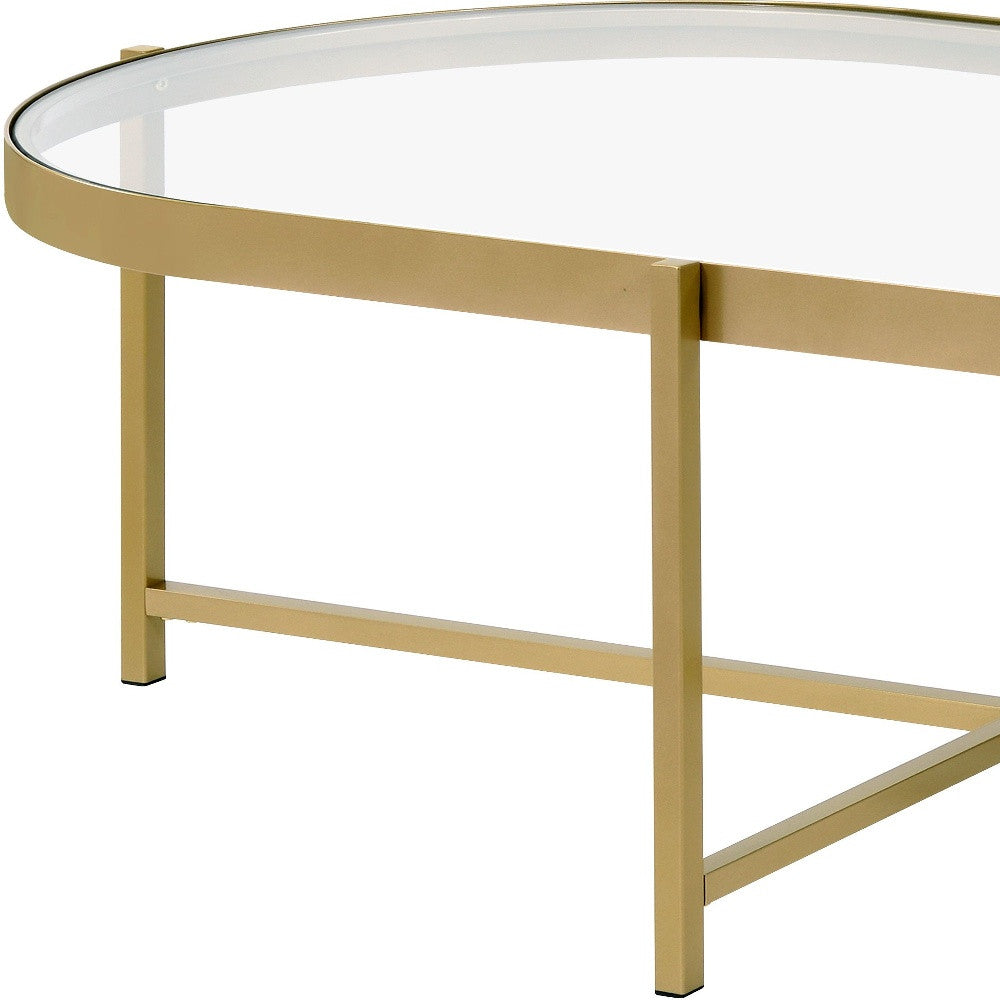 54" Gold and Clear Glass Oval Coffee Table – Modern Elegance with a Sophisticated Touch