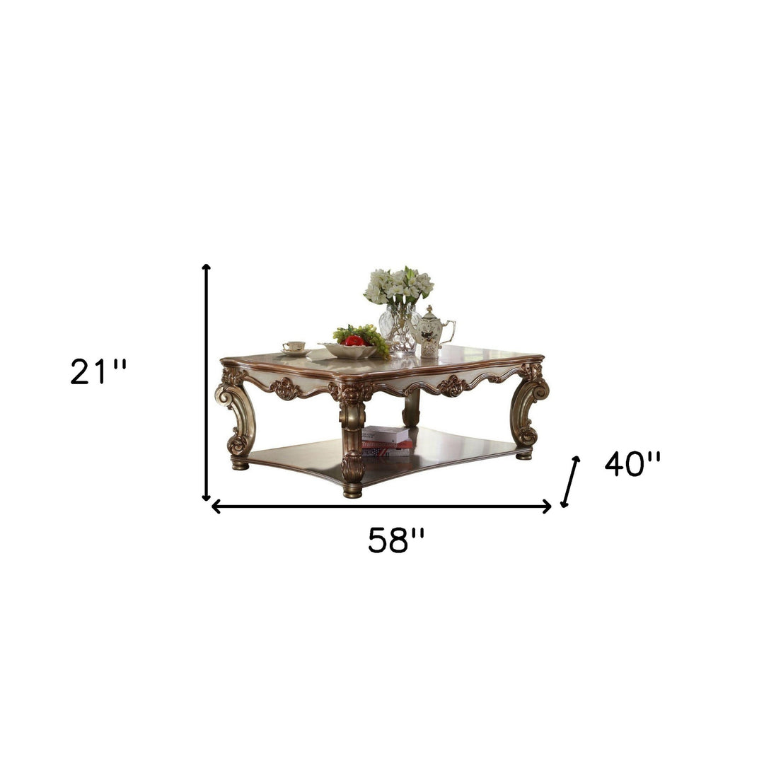 Elevate Your Living Space with the 58-Inch Gold Solid and Manufactured Wood Coffee Table with Shelf