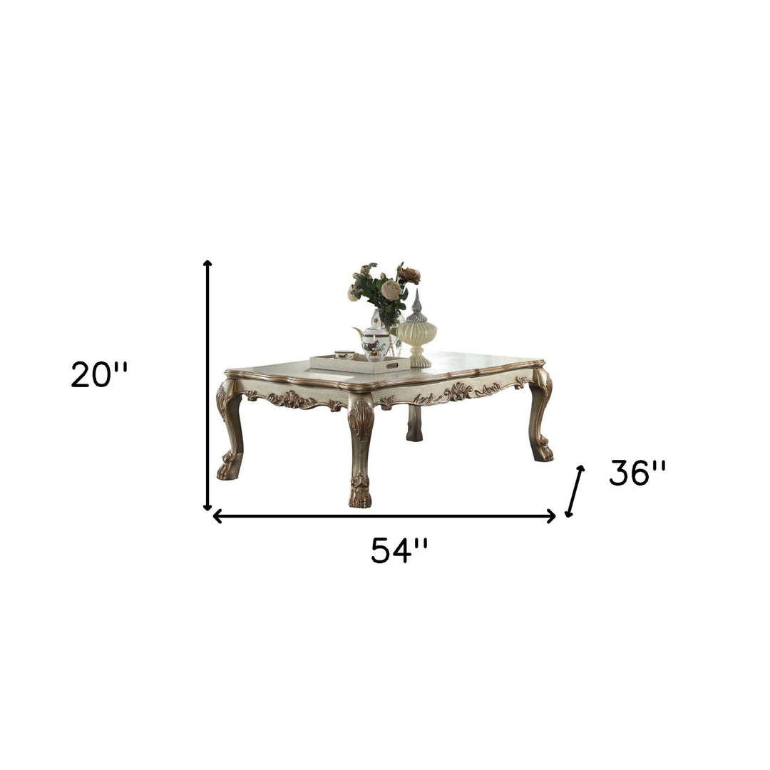 Refined Elegance: 54-Inch Bone and Gold Patina Rectangular Coffee Table