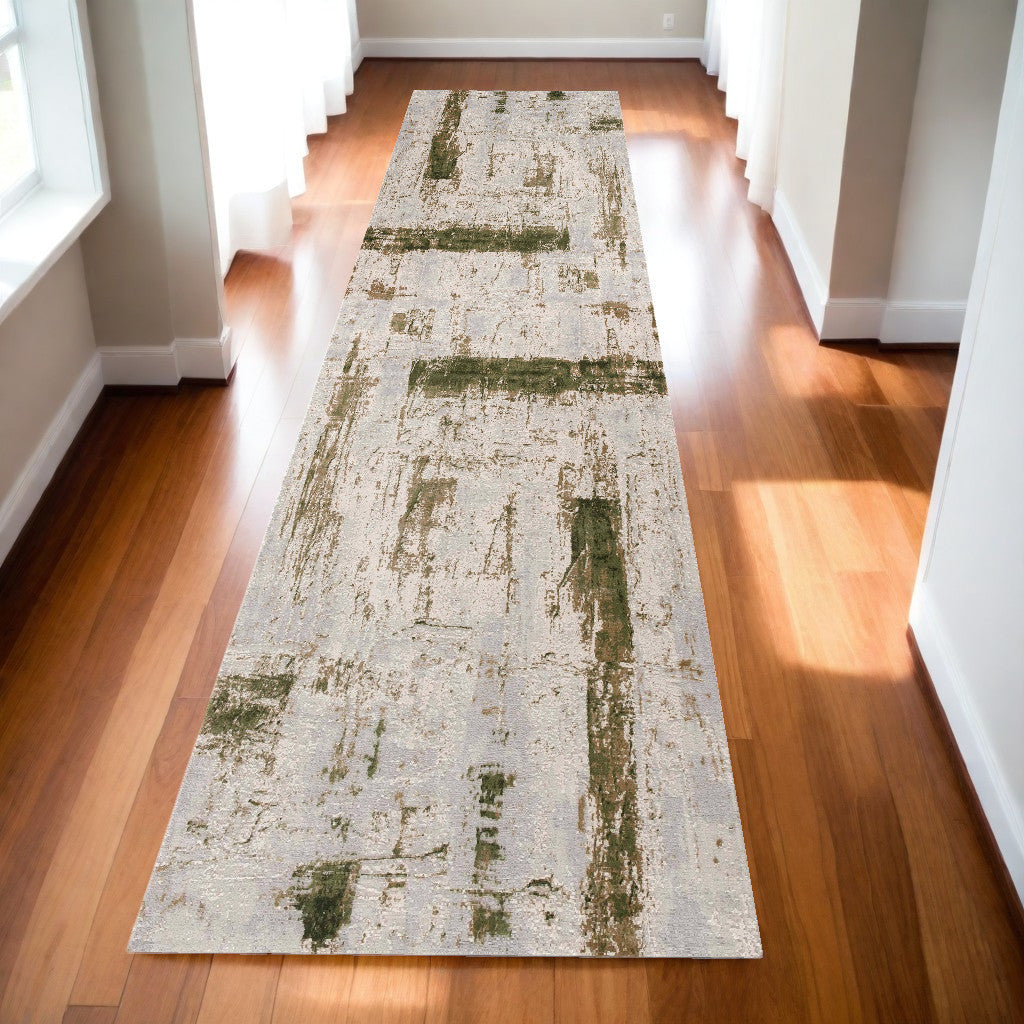 10' Green and Ivory Abstract Power Loom Distressed Runner Rug