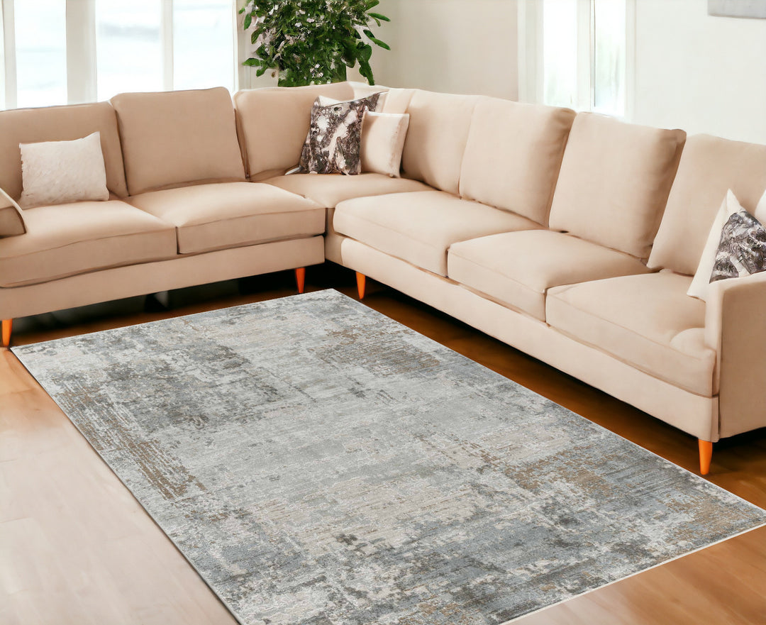 8' X 10' Beige Abstract Power Loom Stain Resistant Area Rug