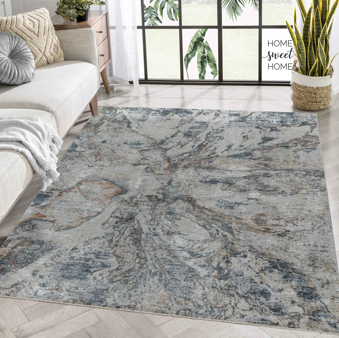 5' X 8' Beige and Blue Abstract Power Loom Area Rug