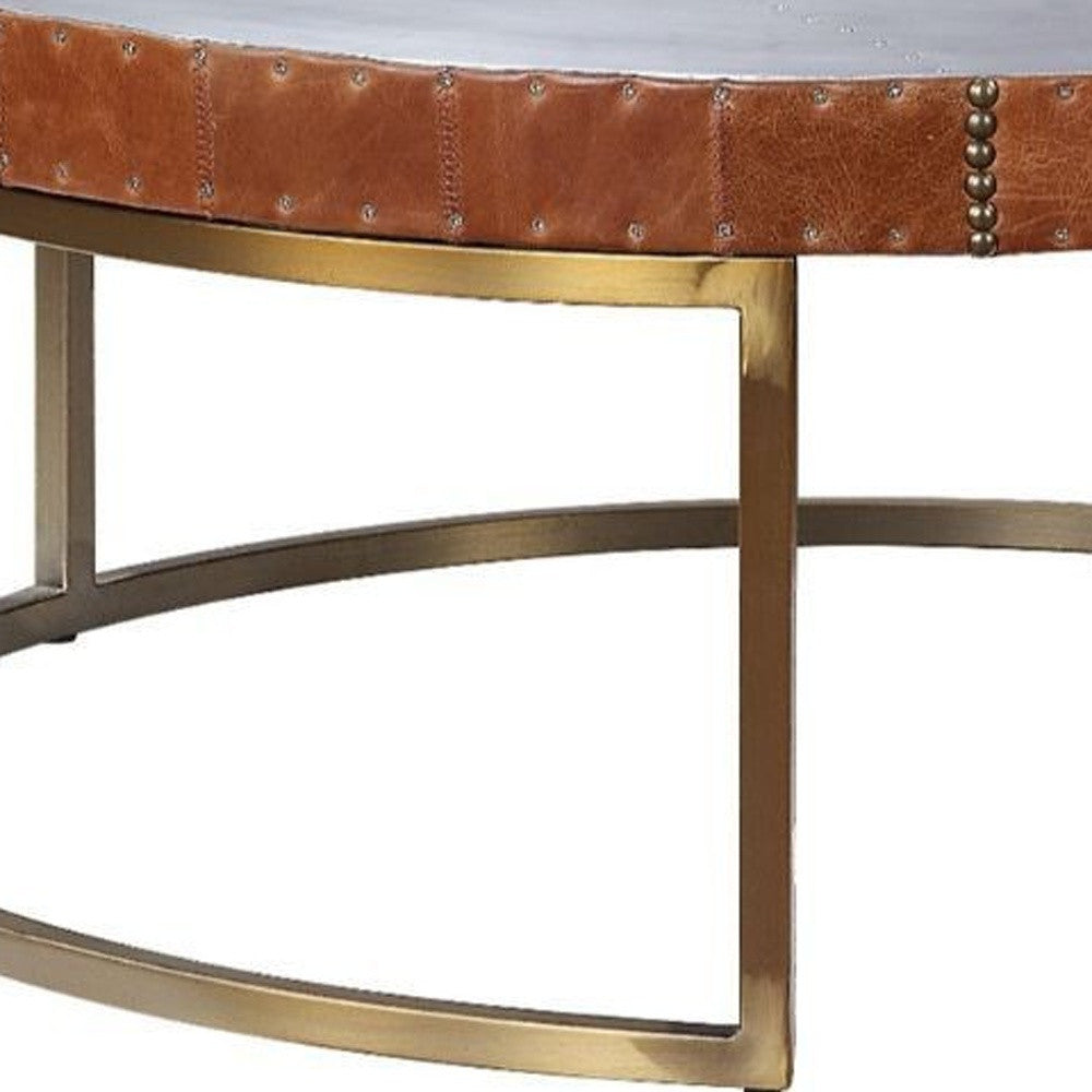 36-Inch Brown Leather and Silver Metal Round Coffee Table