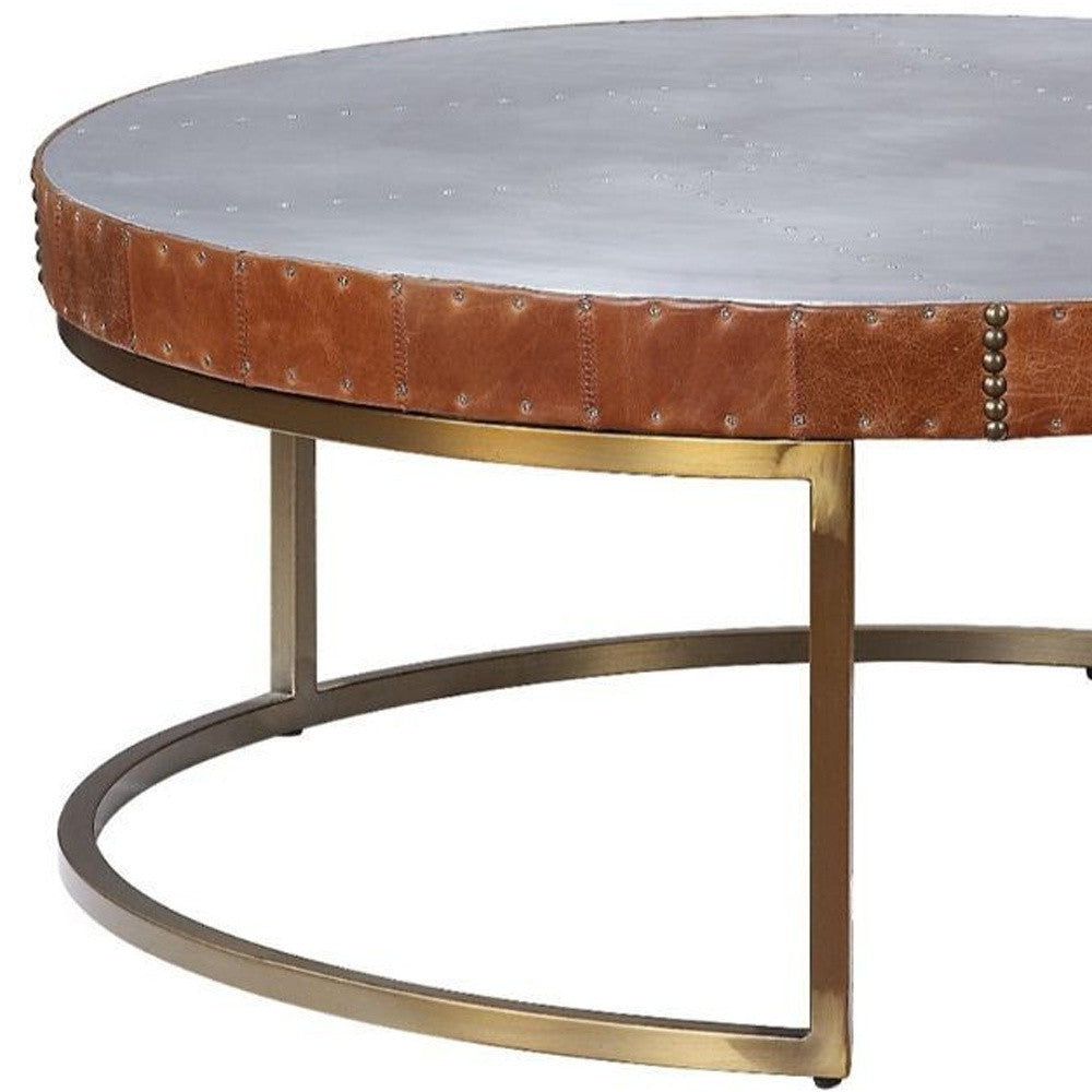 36-Inch Brown Leather and Silver Metal Round Coffee Table