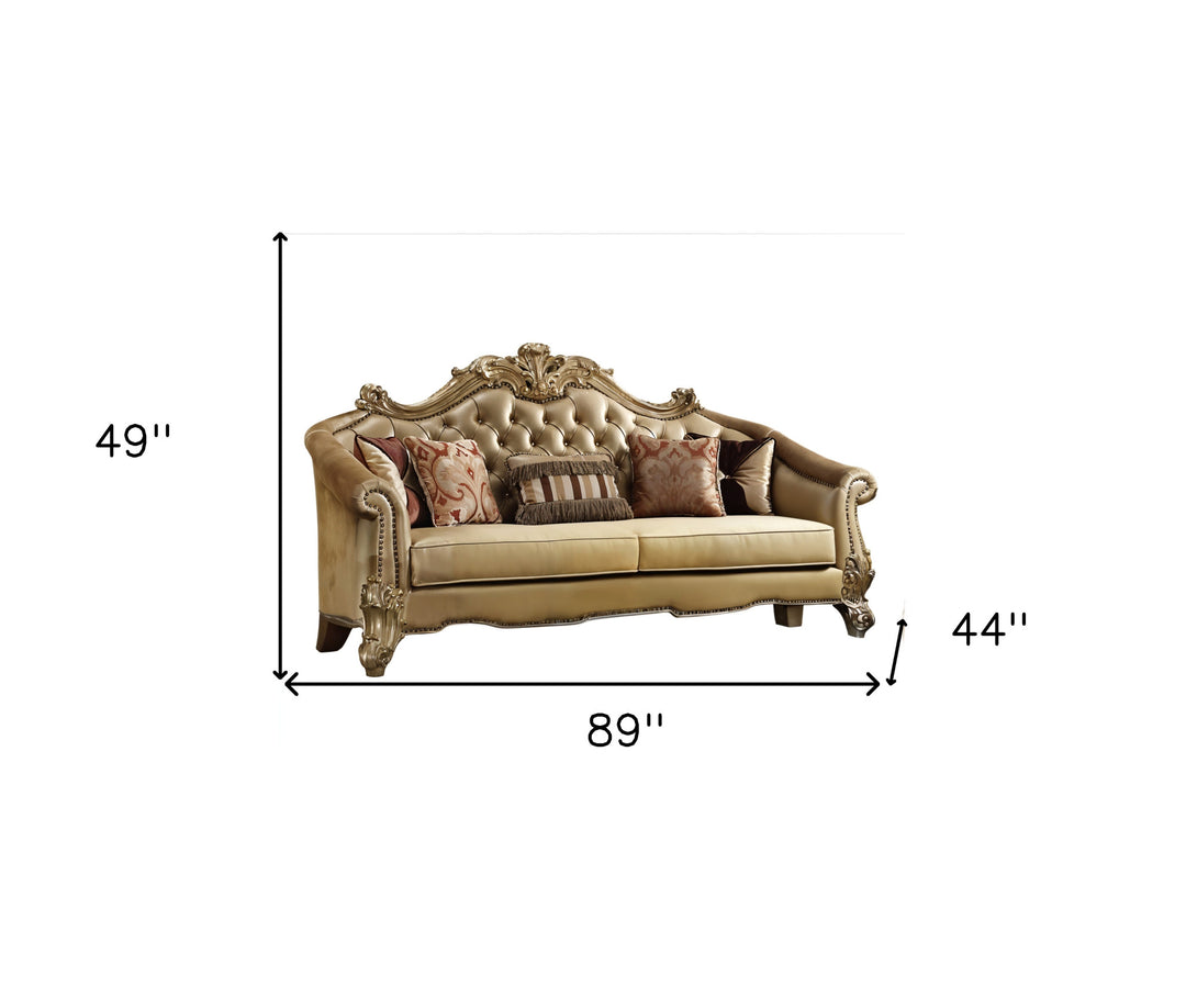 89" Bone Faux Leather Sofa And Toss Pillows With Gold Legs