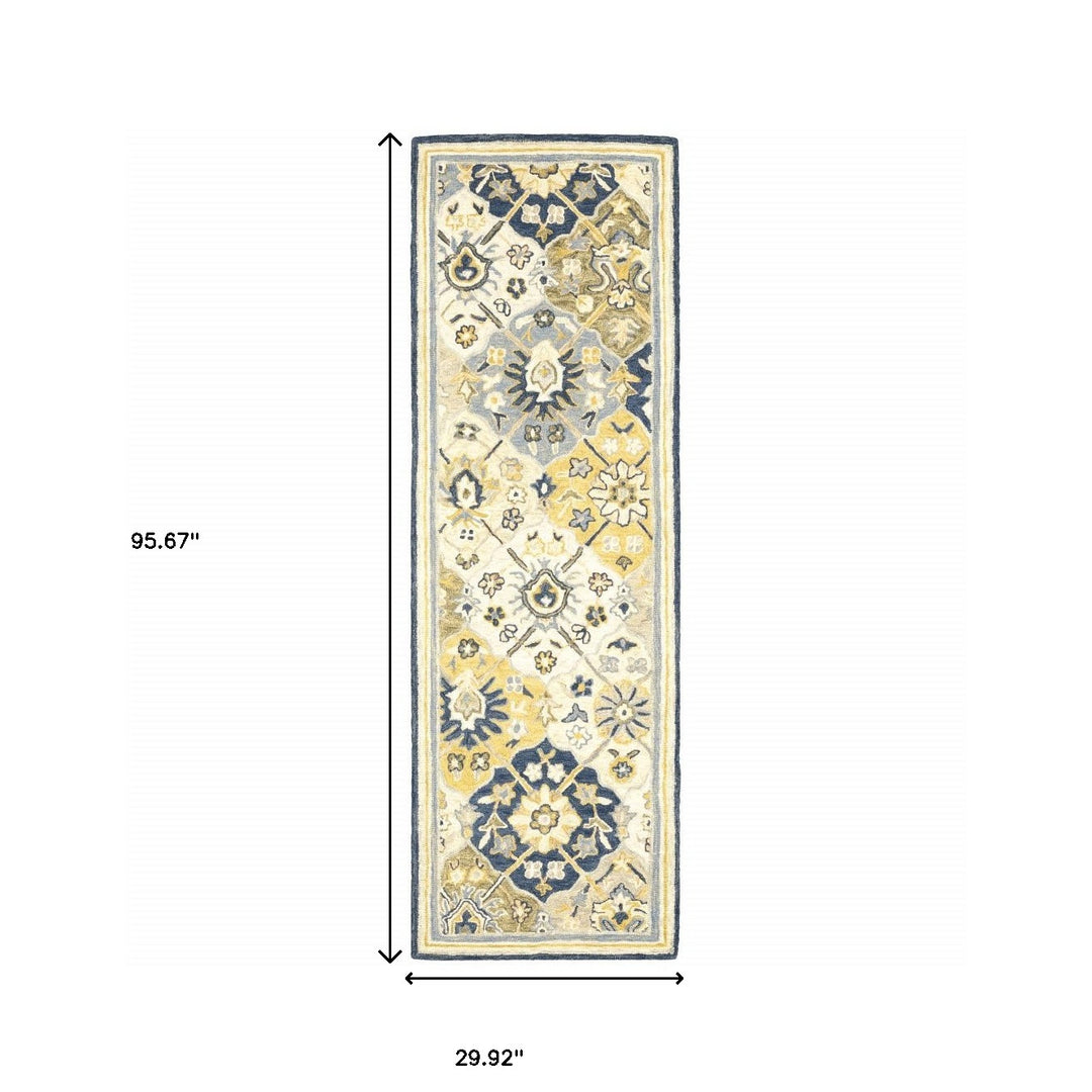 10' X 13' Blue Green Gold Navy And Ivory Geometric Tufted Handmade Stain Resistant Area Rug