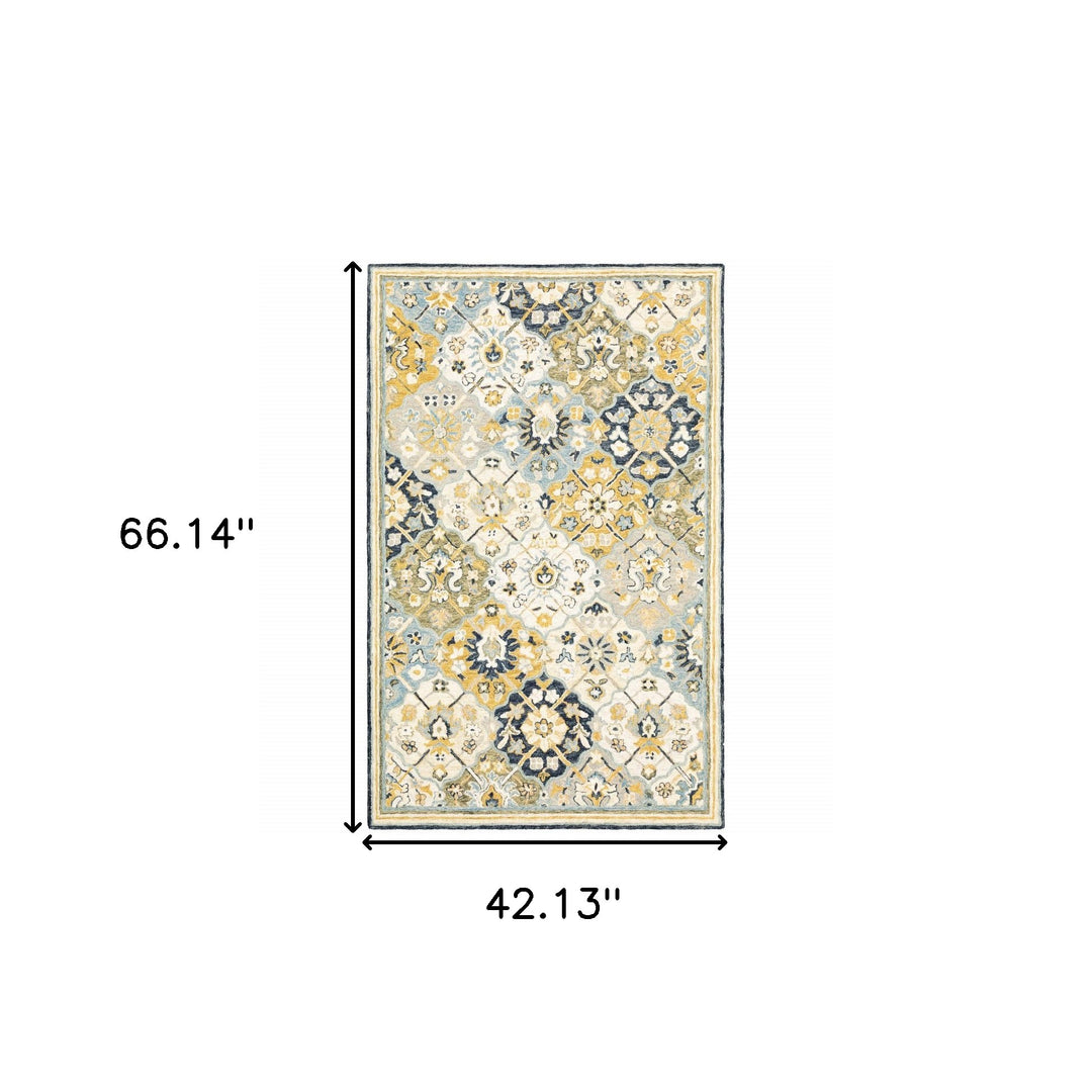 10' X 13' Blue Green Gold Navy And Ivory Geometric Tufted Handmade Stain Resistant Area Rug