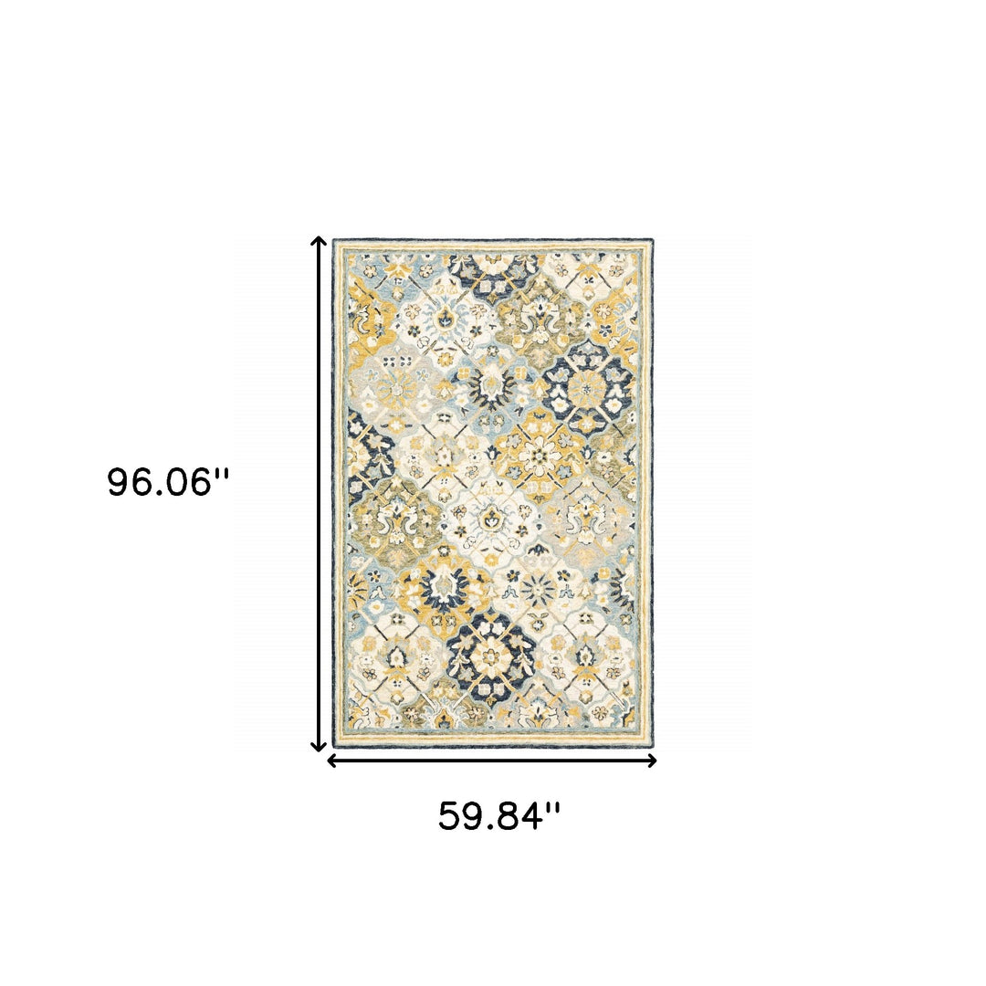 10' X 13' Blue Green Gold Navy And Ivory Geometric Tufted Handmade Stain Resistant Area Rug