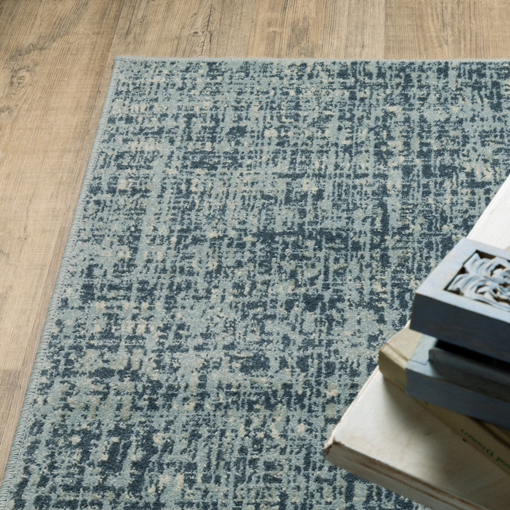 3' X 5' Dark Blue Light Blue Grey Ivory And Beige Abstract Power Loom Stain Resistant Area Rug