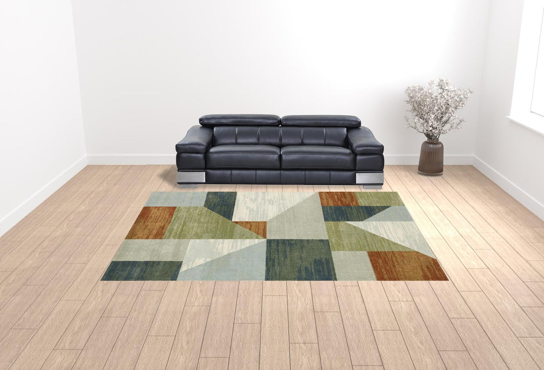 3' X 5' Grey Teal Blue Rust Green And Ivory Geometric Power Loom Stain Resistant Area Rug