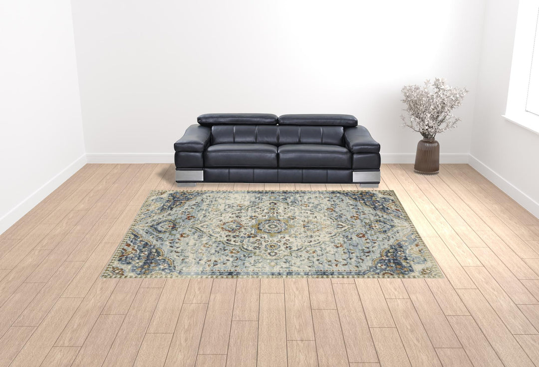 5' X 7' Blue Beige Rust Gold And Teal Oriental Power Loom Stain Resistant Area Rug