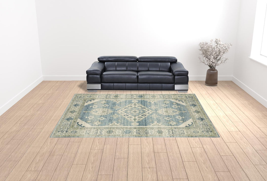 3' X 5' Blue Grey Beige And Teal Oriental Power Loom Stain Resistant Area Rug