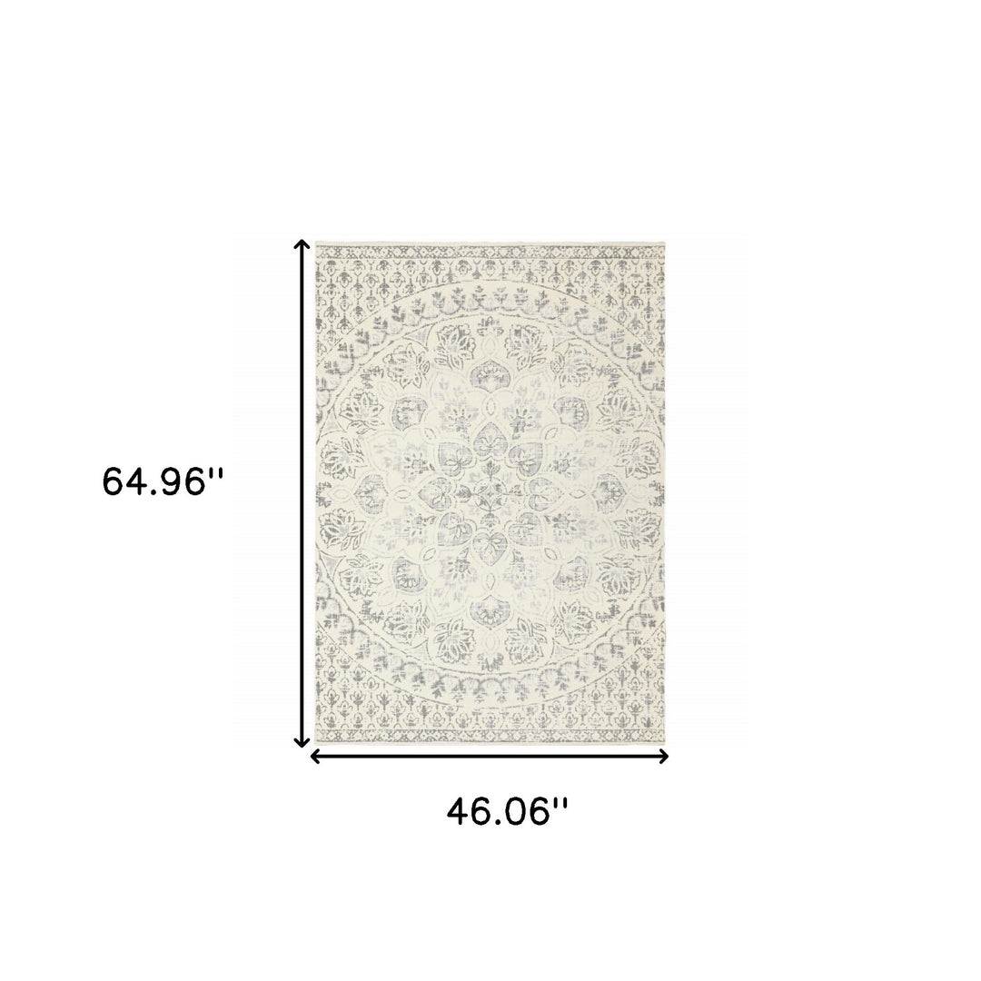 4' X 6' Ivory And Grey Floral Power Loom Stain Resistant Area Rug