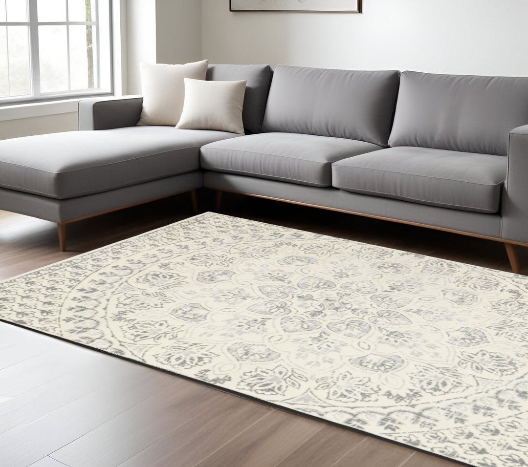 4' X 6' Ivory And Grey Floral Power Loom Stain Resistant Area Rug