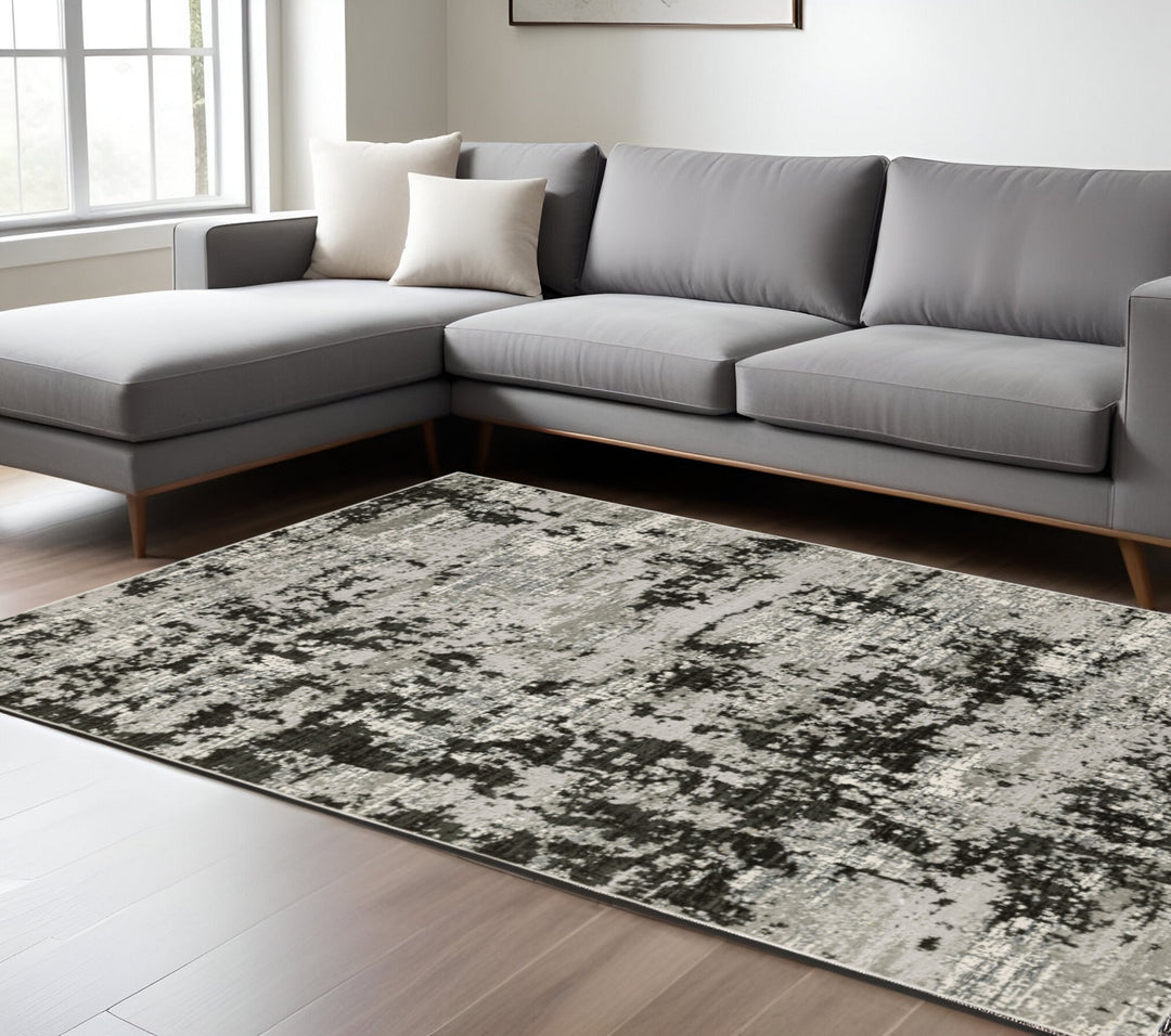 2' X 8' Grey Charcoal Black And Ivory Abstract Power Loom Stain Resistant Runner Rug