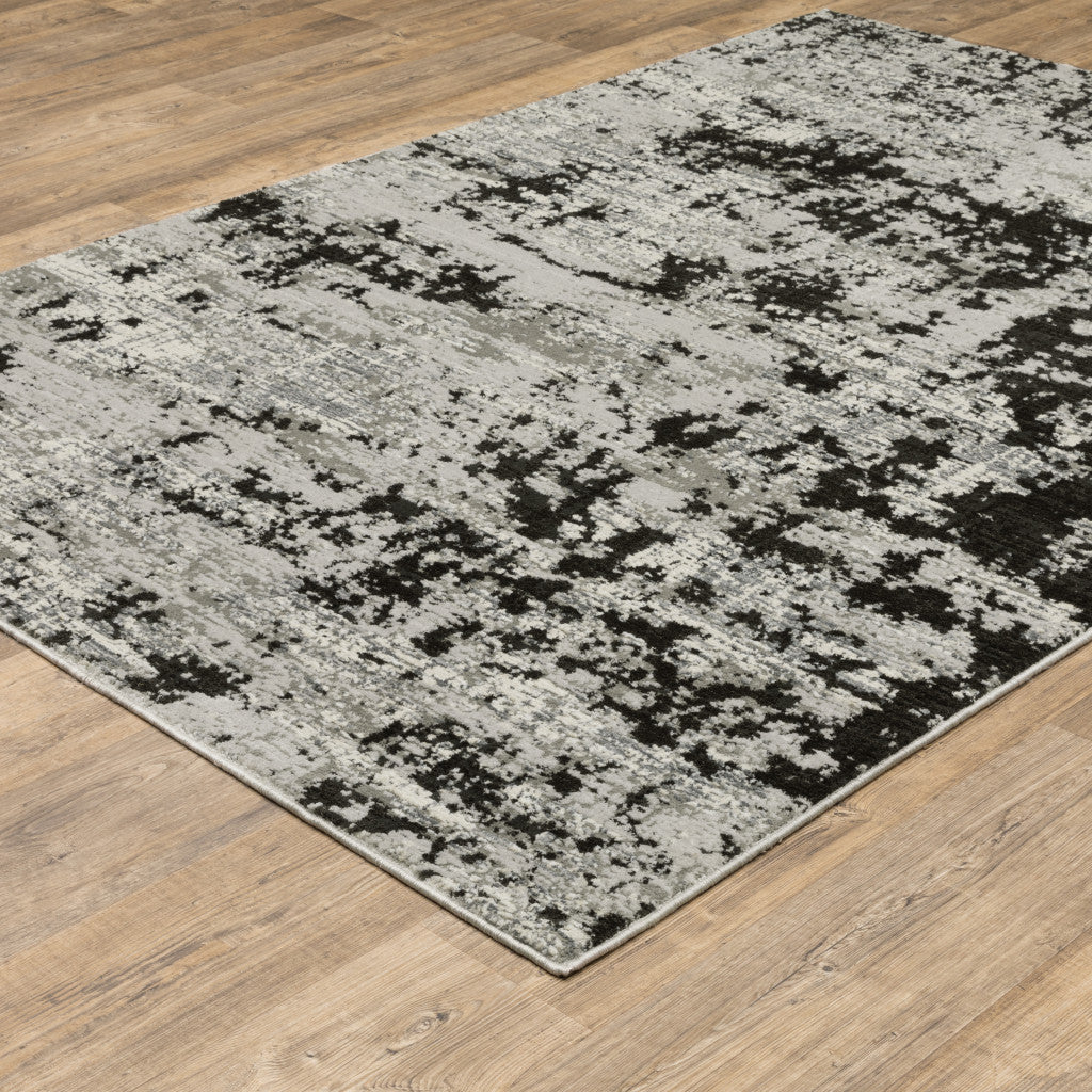 2' X 8' Grey Charcoal Black And Ivory Abstract Power Loom Stain Resistant Runner Rug