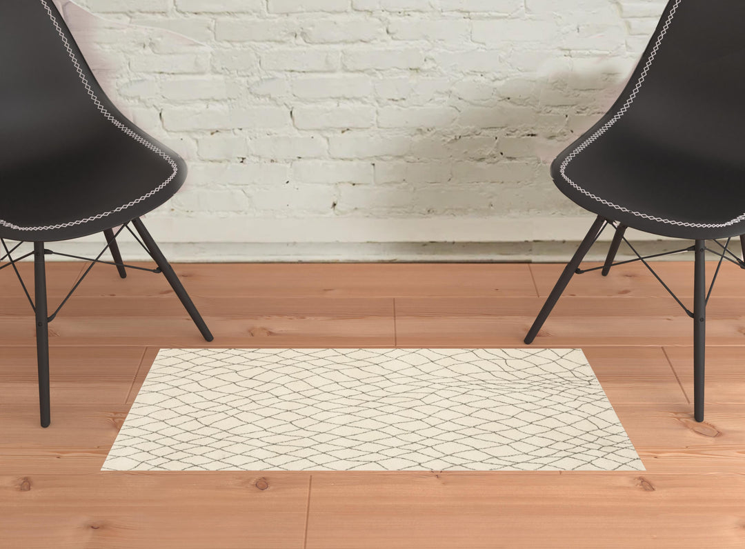 2' X 8' Ivory And Grey Geometric Power Loom Stain Resistant Runner Rug