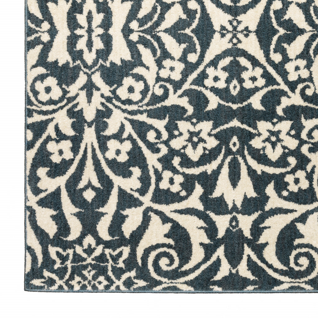 10' X 13' Blue And Ivory Floral Power Loom Stain Resistant Area Rug