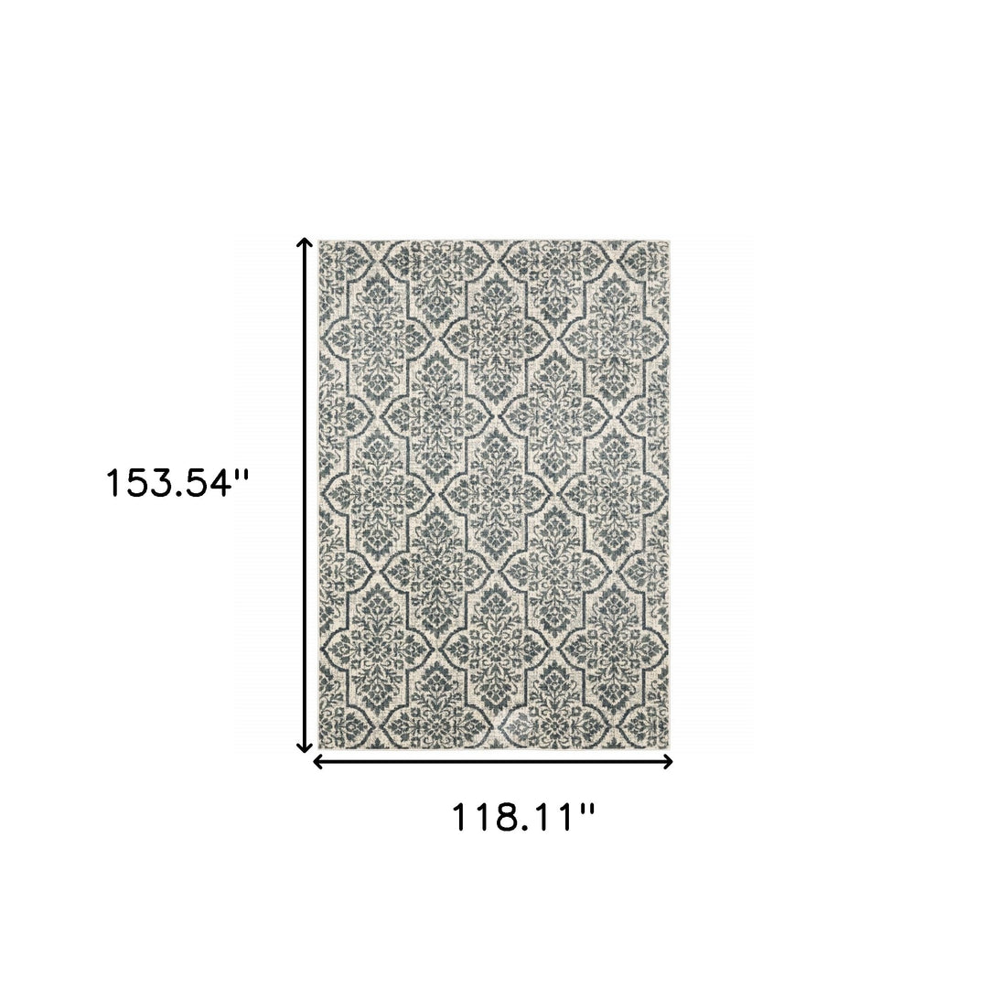 10' X 13' Ivory Blue And Sage Floral Power Loom Stain Resistant Area Rug