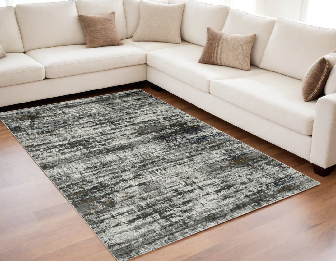 2' X 8' Ivory Charcoal Grey Blue Rust And Brown Abstract Power Loom Stain Resistant Runner Rug