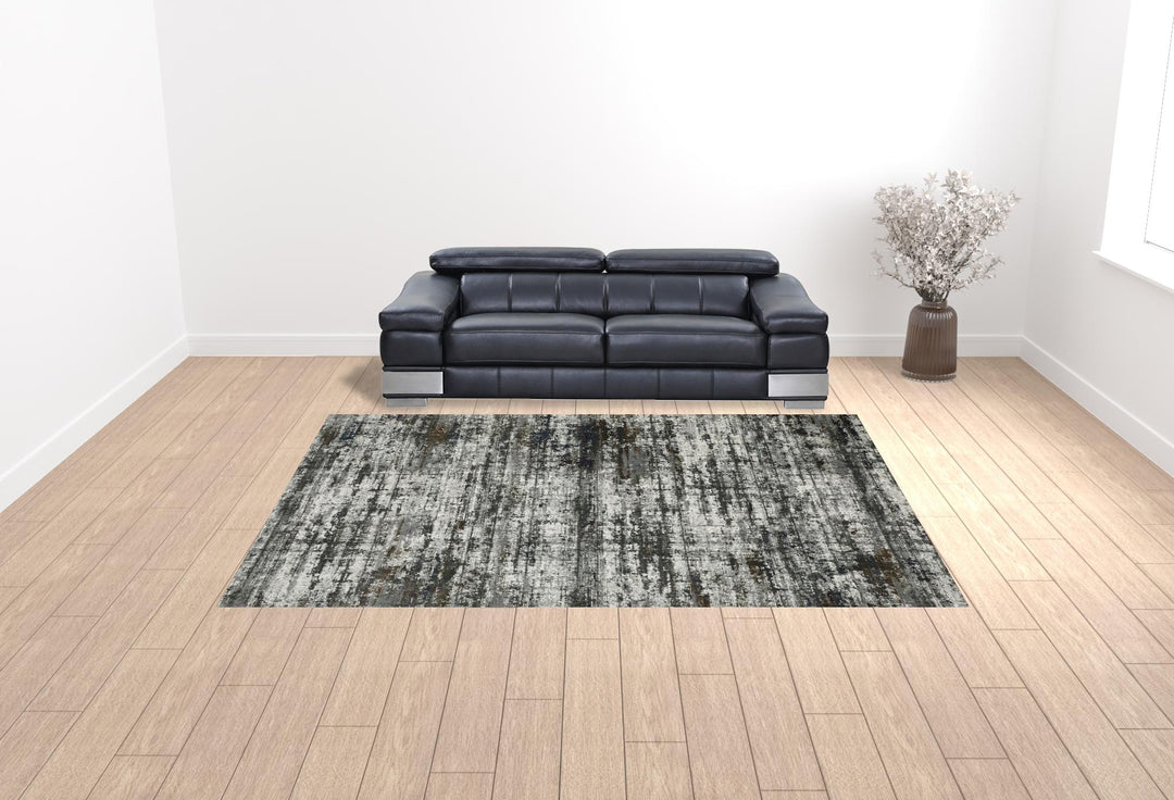 2' X 8' Ivory Charcoal Grey Blue Rust And Brown Abstract Power Loom Stain Resistant Runner Rug