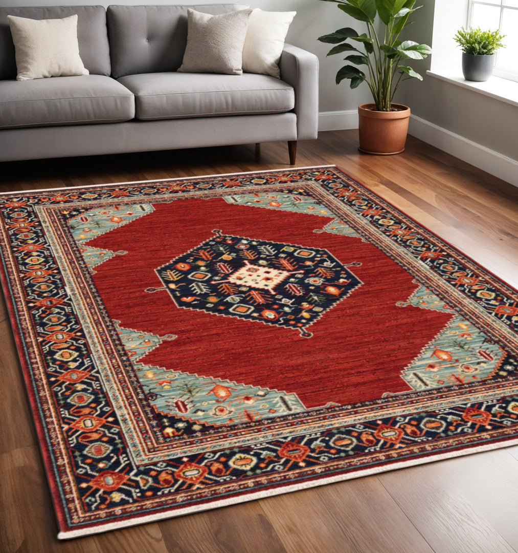 2' X 3' Red Blue Orange And Ivory Oriental Power Loom Stain Resistant Area Rug With Fringe