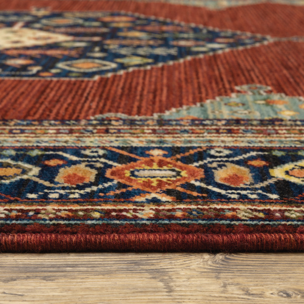 2' X 3' Red Blue Orange And Ivory Oriental Power Loom Stain Resistant Area Rug With Fringe