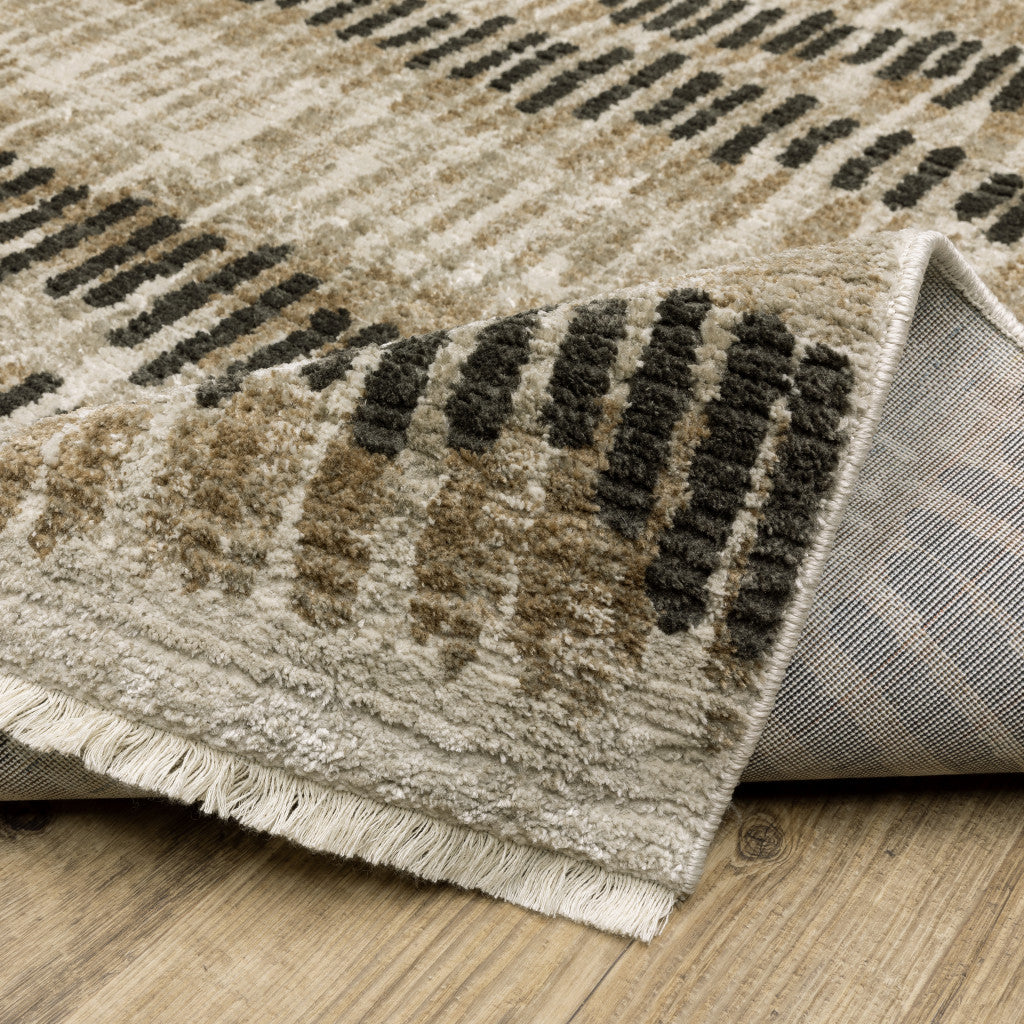 2' X 8' Beige Ivory Charcoal Brown Tan And Grey Abstract Power Loom Stain Resistant Runner Rug With Fringe