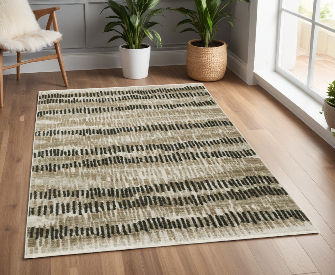 2' X 8' Beige Ivory Charcoal Brown Tan And Grey Abstract Power Loom Stain Resistant Runner Rug With Fringe