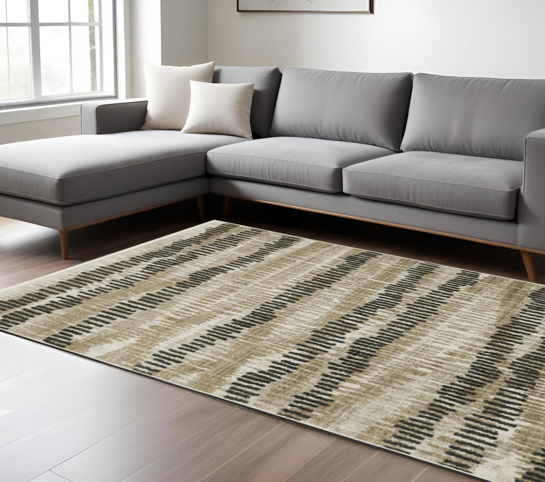 2' X 8' Beige Ivory Charcoal Brown Tan And Grey Abstract Power Loom Stain Resistant Runner Rug With Fringe