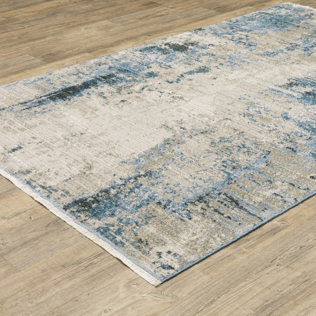 2' X 8' Blue Grey Ivory Light Blue And Dark Blue Abstract Power Loom Stain Resistant Runner Rug With Fringe