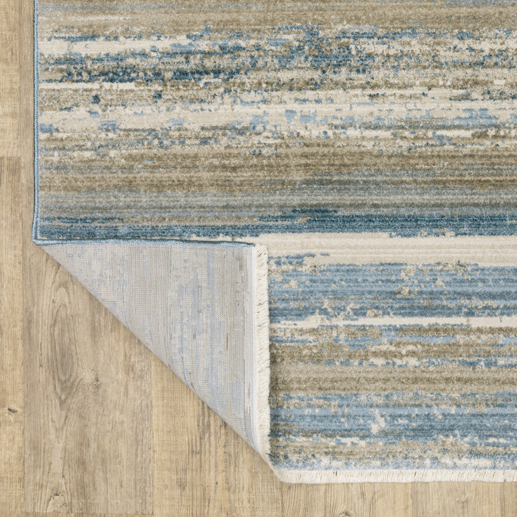 2' X 8' Blue And Ivory Abstract Power Loom Runner Rug With Fringe