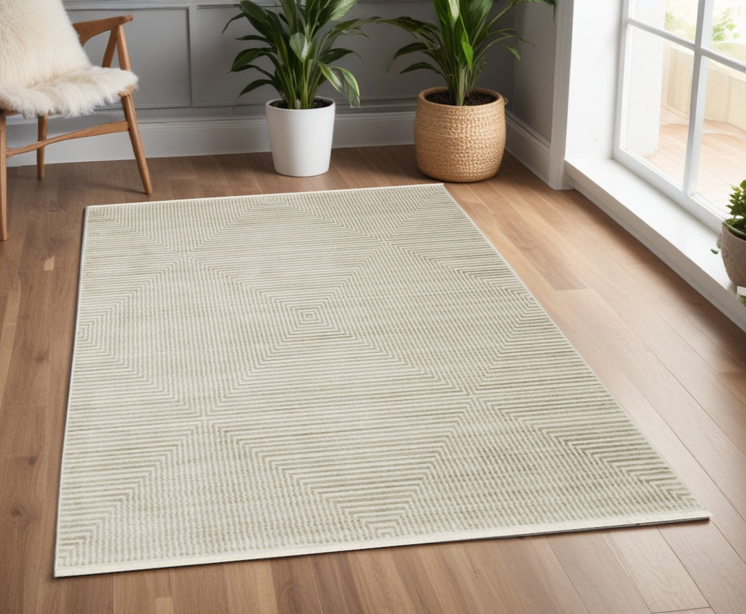 8' Ivory Beige Taupe And Tan Geometric Power Loom Runner Rug With Fringe