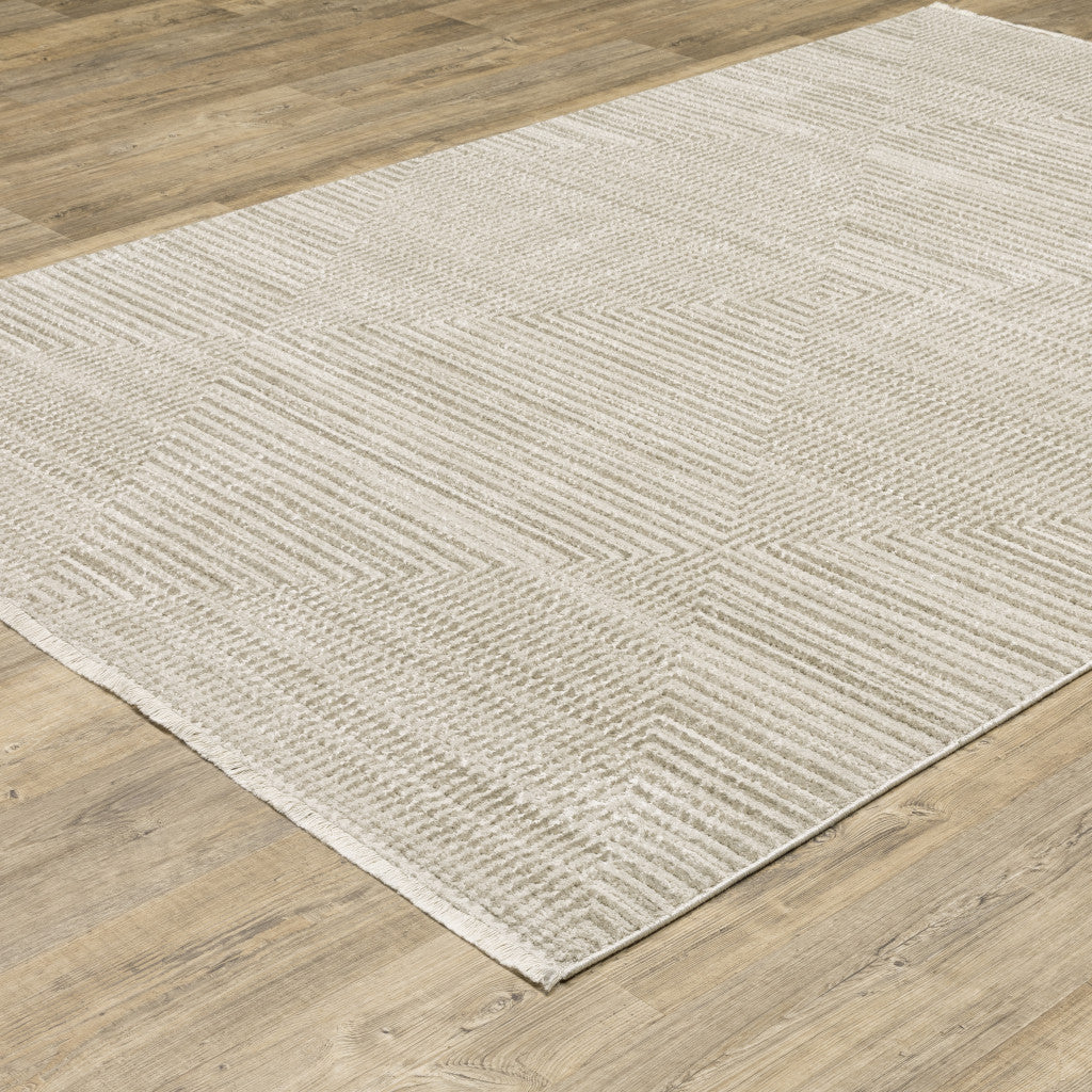 8' Ivory Beige Taupe And Tan Geometric Power Loom Runner Rug With Fringe